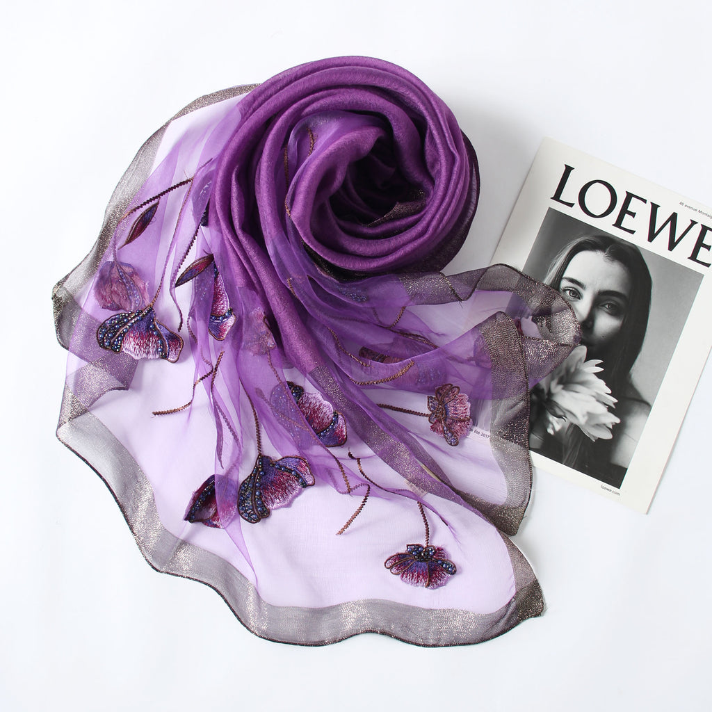 Gray Jeelow scarf shown with metallic woven border detail
