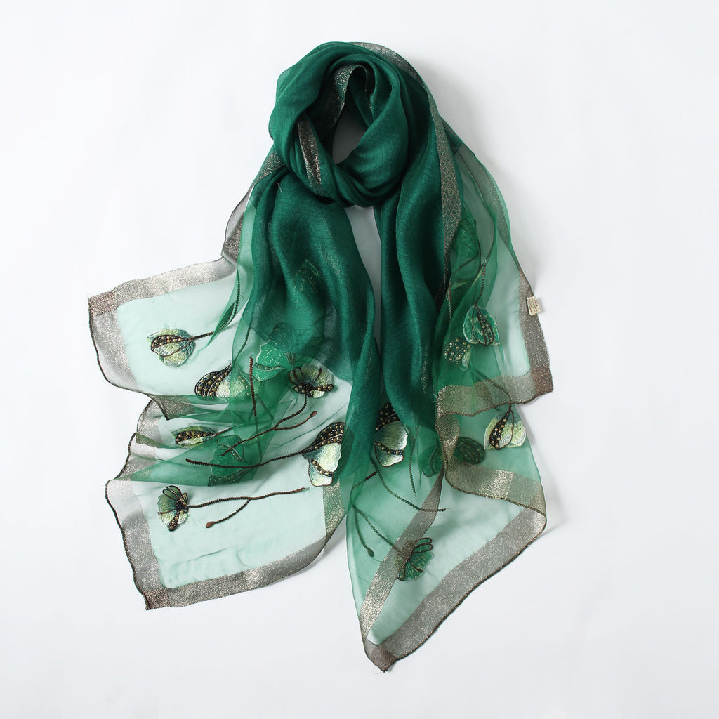 Jeelow poppy beaded scarf collection — navy colorway laid flat