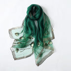 Jeelow poppy beaded scarf collection — navy colorway laid flat