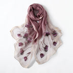Gray Jeelow scarf shown with metallic woven border detail