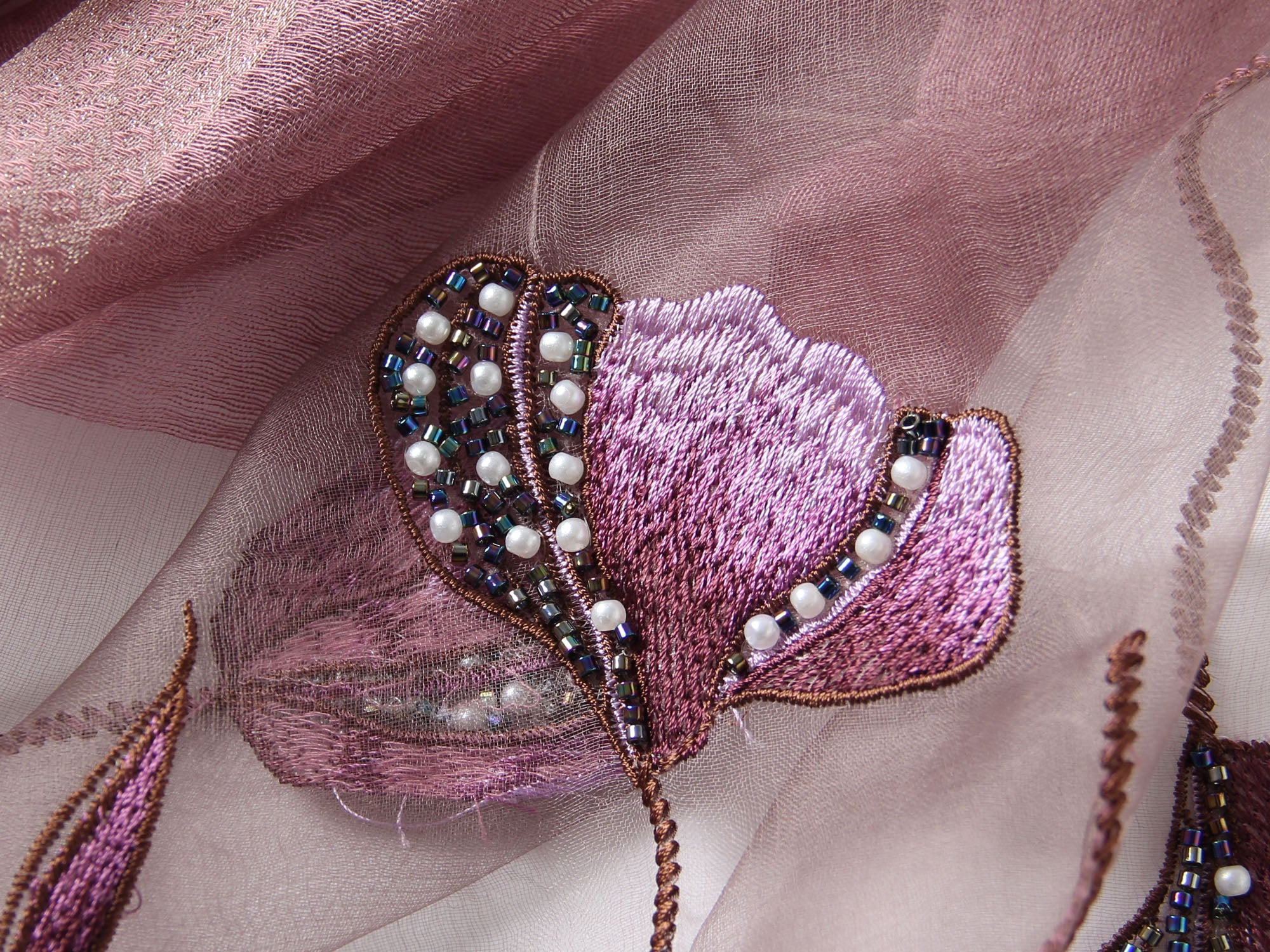 Mauve Jeelow scarf shown with metallic woven border detail