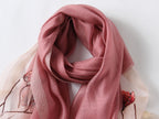Jeelow poppy beaded scarf collection — mauve colorway laid flat