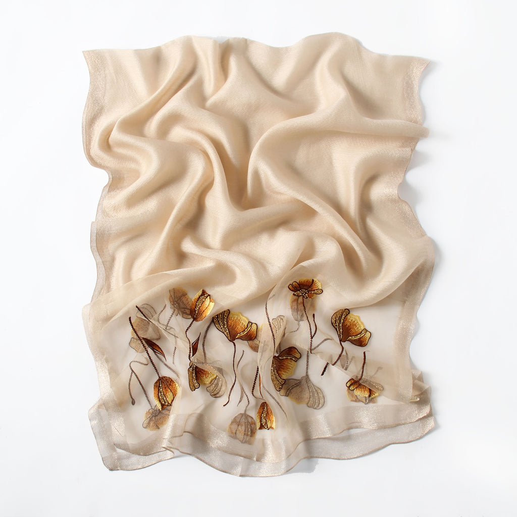 Champagne embroidered poppy scarf with beaded centers, draped view