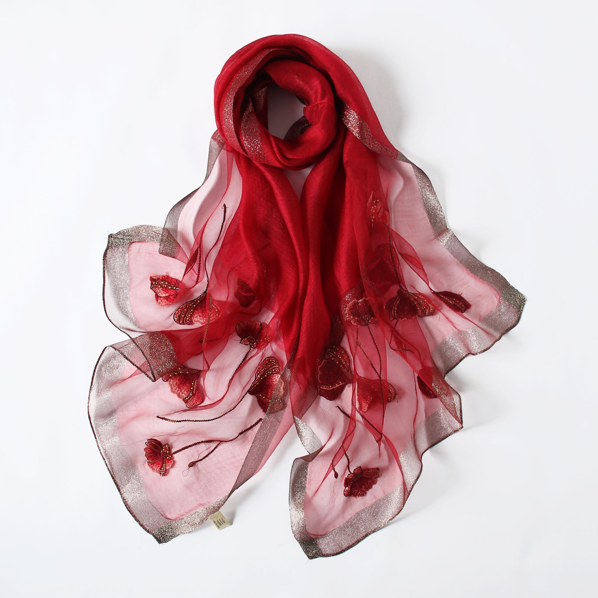 Jeelow poppy beaded scarf collection — mauve colorway laid flat