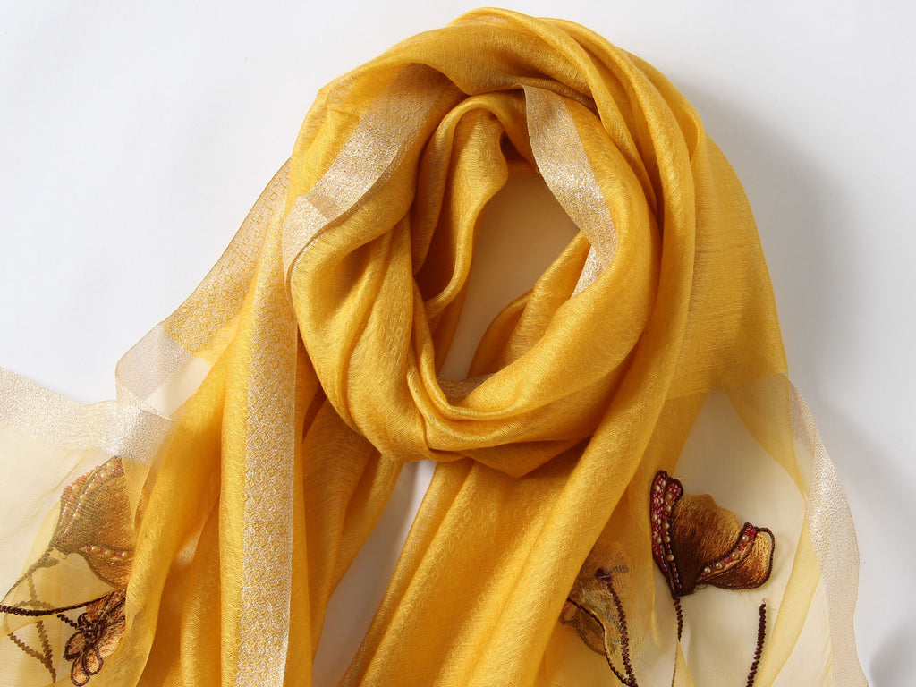 Champagne Jeelow scarf shown with metallic woven border detail