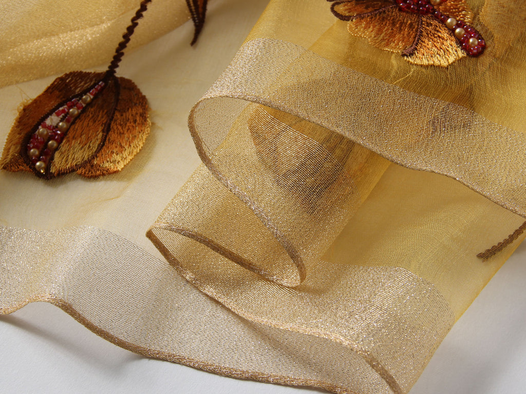 Champagne embroidered poppy scarf with beaded centers, draped view